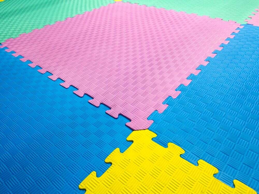 An EVA mat made of colorful puzzle-shaped squares