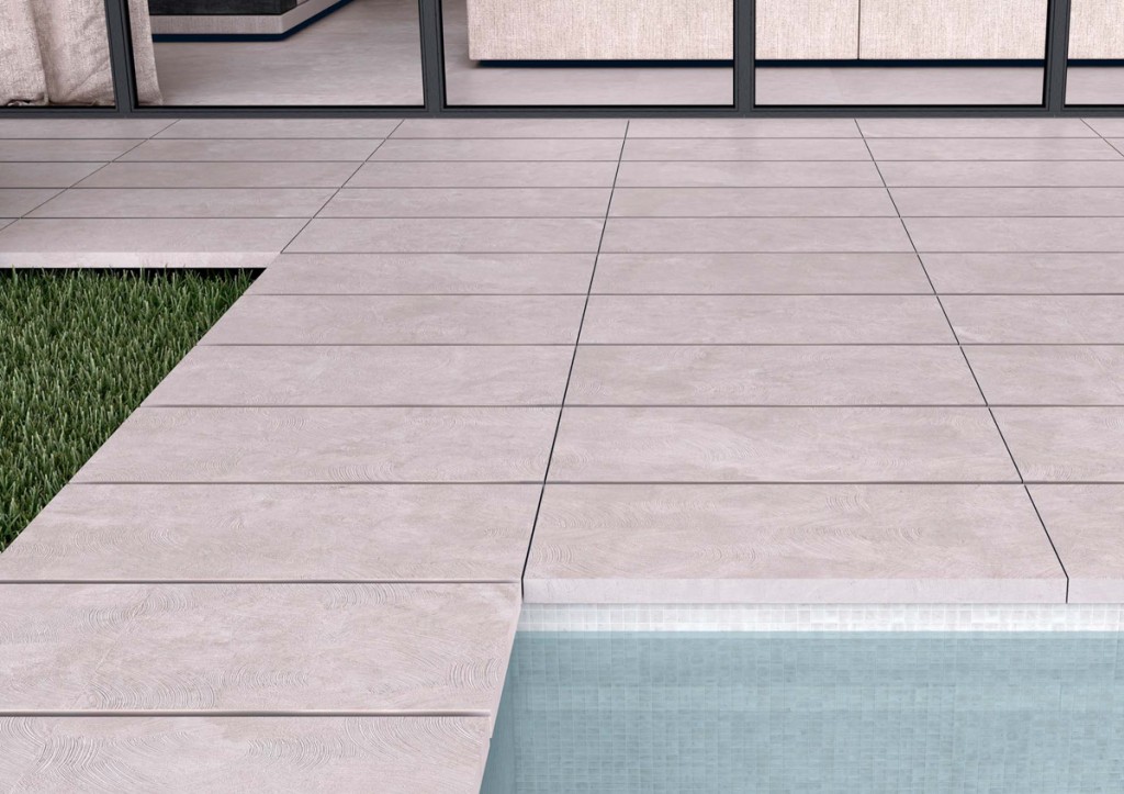 concrete-style pool floor of a house