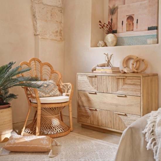 Scandinavian bedroom with wooden dresser