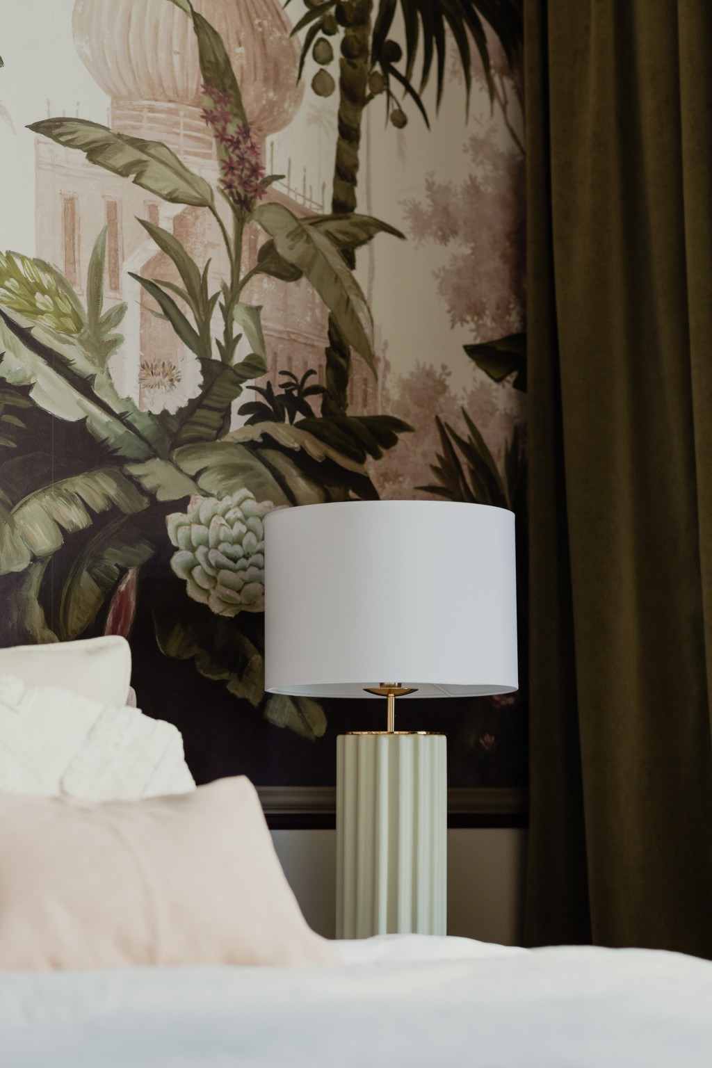 A white bedside lamp