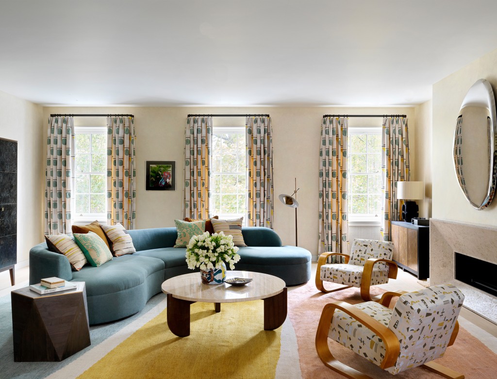 A curved sofa in an elegant living room