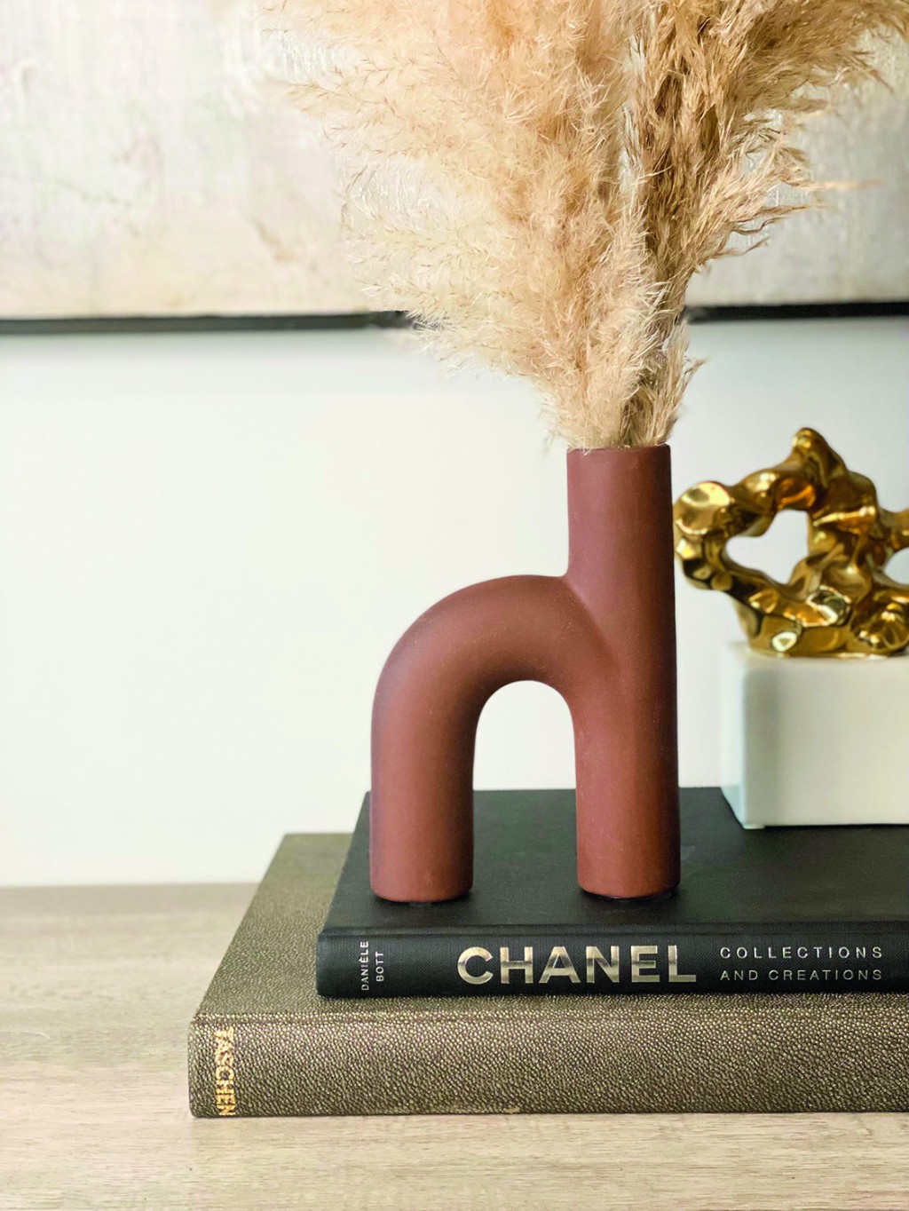 Red clay ceramics placed on books