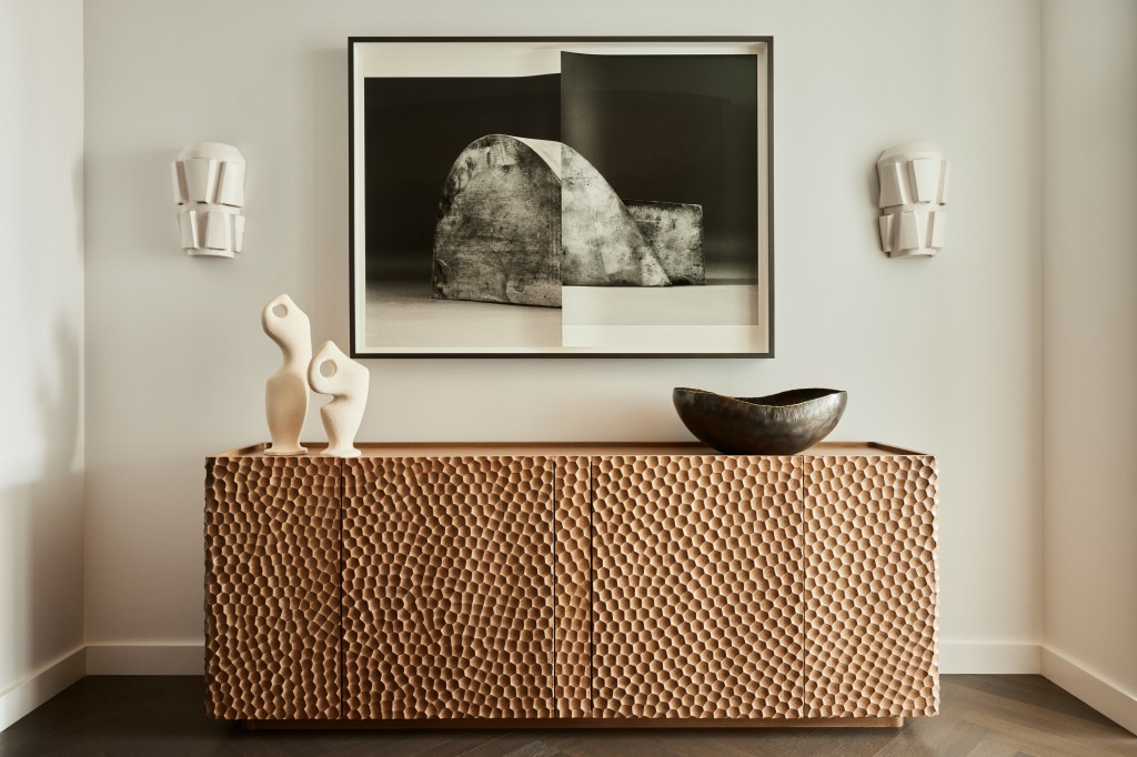 A textured wooden console