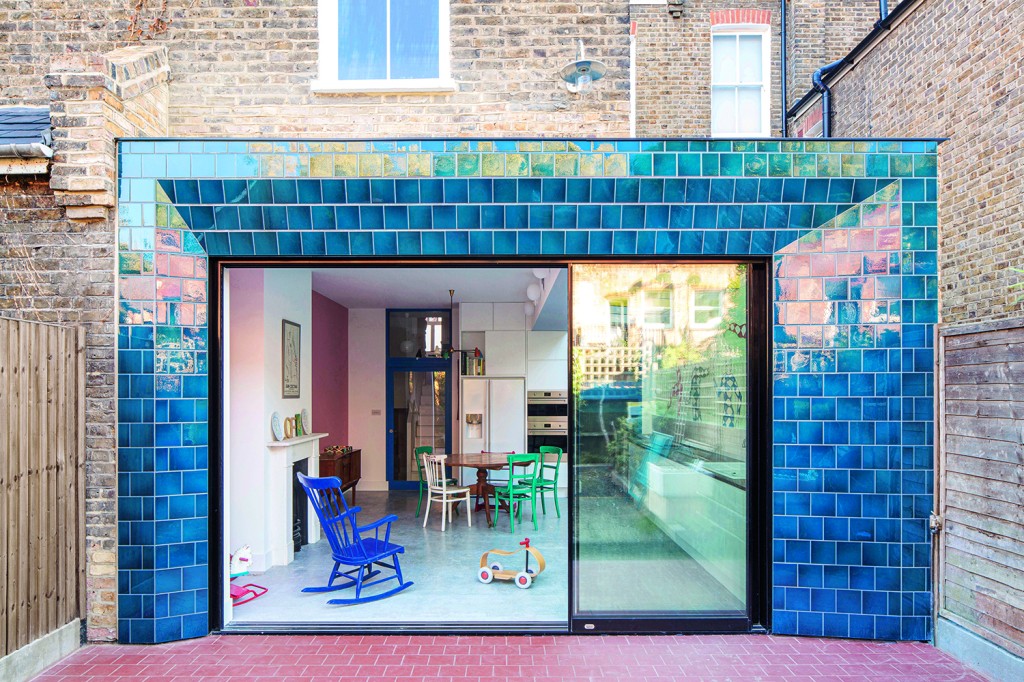 An outdoor space with glazed tiles on the exterior walls