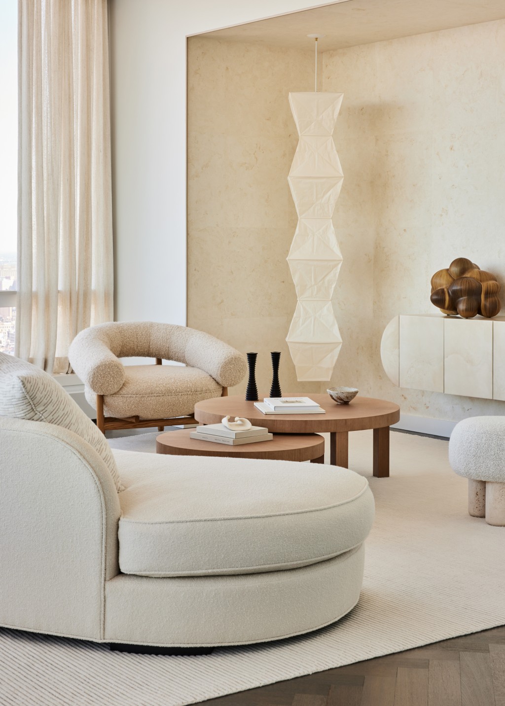 A living room with a long tubular light