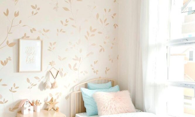 Child's room with minimalist wooden furniture in its natural tone